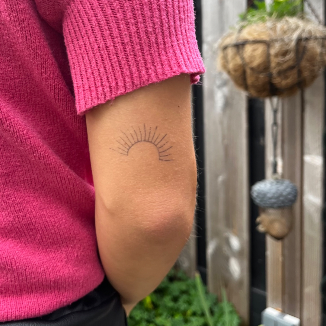 Sol de tatuaje temporal