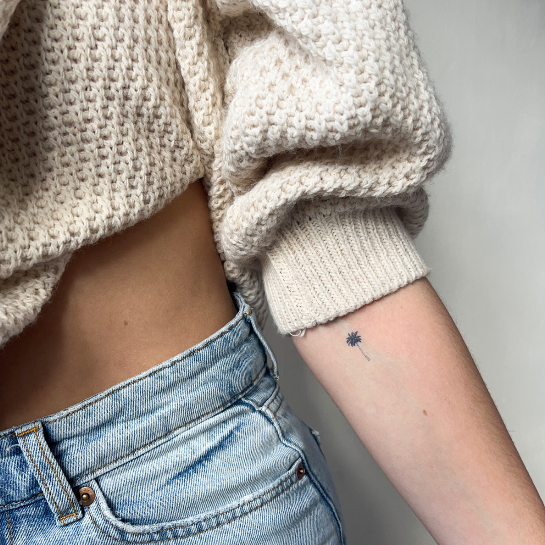 Tatuaje temporal de palmera