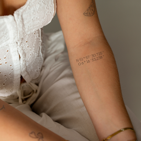 Tatuaje de coordenadas