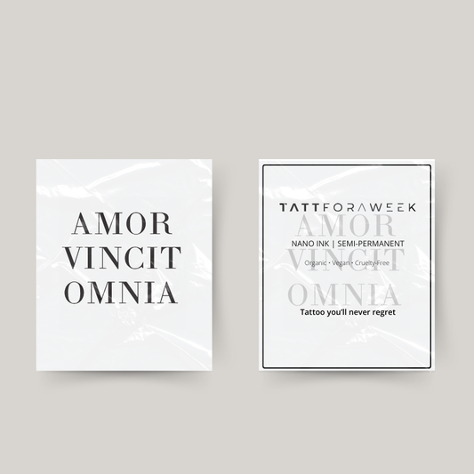 Tatuaje temporal amor vincit omnia