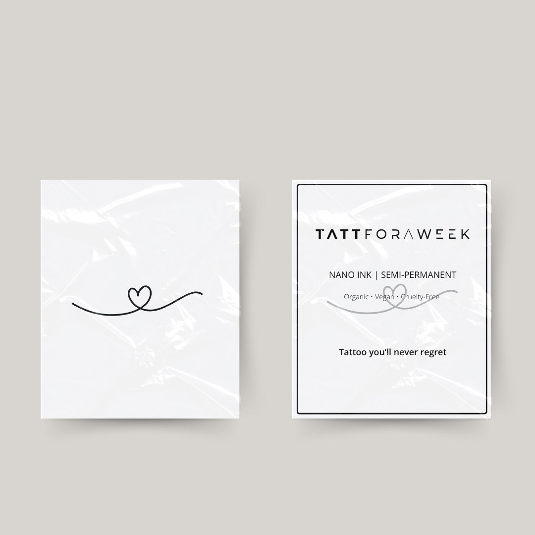 Tatuaje temporal de corazón con lazo